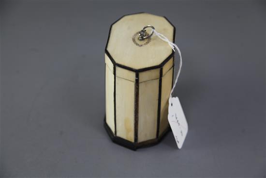 A Regency ten sided inlaid ivory tea caddy, height 4.25in.